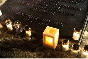 A Holocaust Memorial consisting of a lit candle