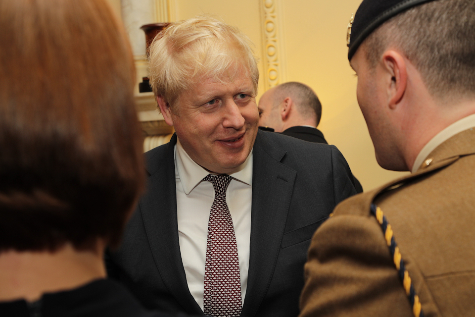 Prime Minister Boris Johnson talking to nominees at the Downing Street reception