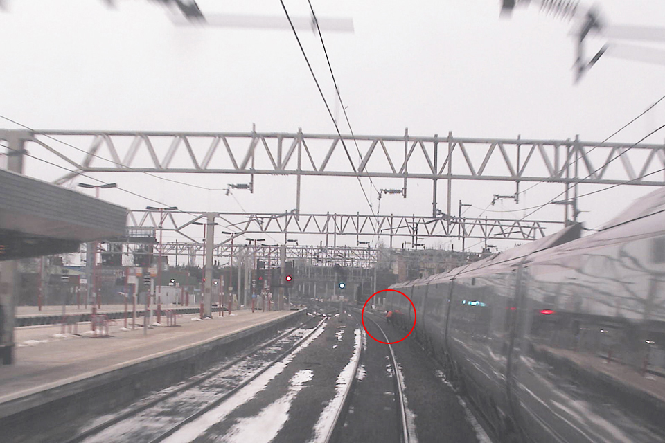 CCTV of the near miss at Stafford taken from the approaching train. The staff in hi-visibility clothing are in the six foot next to the stationary train.