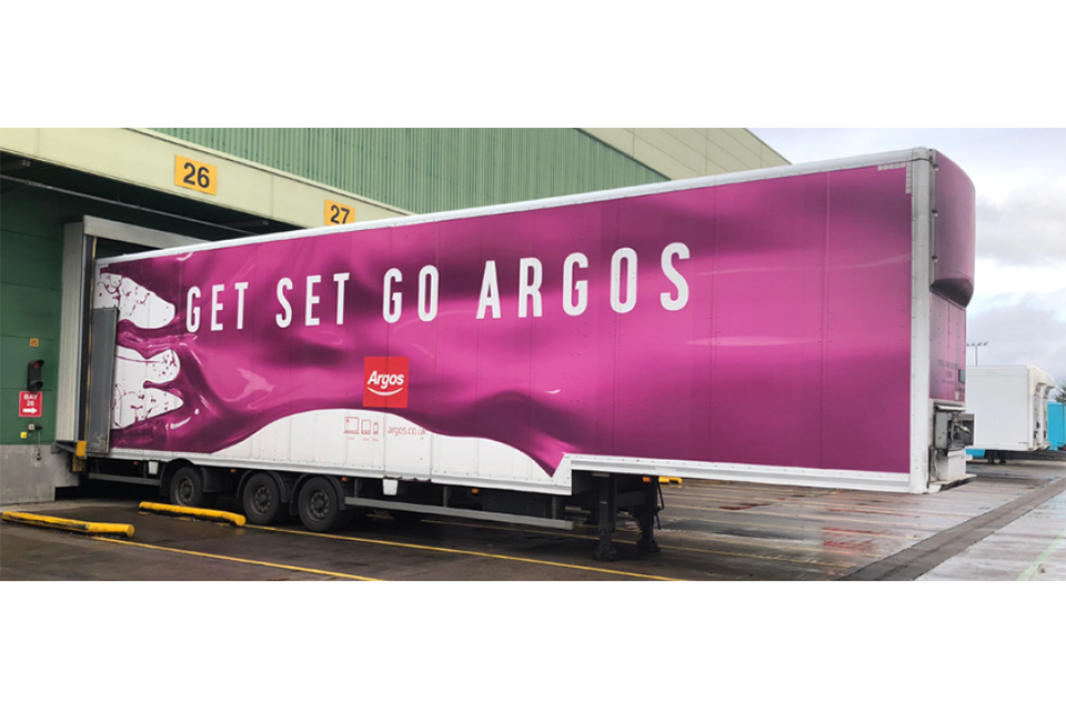Longer semi-trailer in Argos at a loading dock
