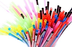 A picture of various multi-coloured plastic straws