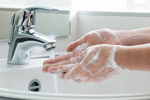 Hands being washed