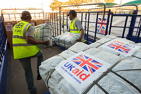 Staff handle UK Aid packages