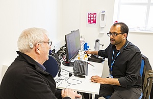 Doctor talking to a patient.
