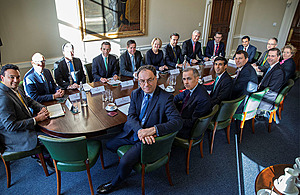 An Image of the Chancellor and the Governor of the Bank of England meeting with members of the Banking industry.