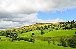 Rolling hills under a blue sky