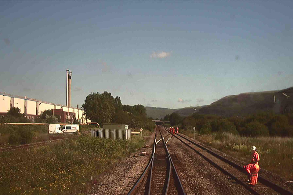 FFCCTV image looking towards Port Talbot from a train on the down main line at approximately 09:24 hrs, showing the two groups working on the open up main line approximately 100 metres apart