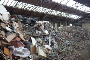 Waste piled up in a warehouse