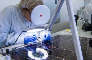 A worker with a solar panel