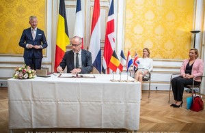 British Ambassador to Belgium, Martin Shearman CVO, signing the treaties