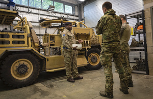 Estonian special forces receive instruction from a British Army soldier