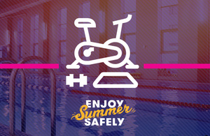 An exercise bike with the words 'enjoy summer safely'
