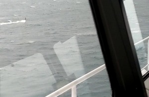 Submarine periscope as seen from ferry