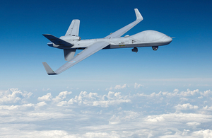 Image depicts a rendering of a Protector aircraft flying in a blue sky.