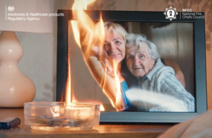Fire spreads over a photo of two women, symbolising the highly flammable combination of dried emollients on fabric