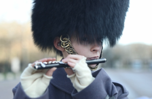 Lance Corporal Rosemarie Coetzer playing a musical instrument. MOD Crown Copyright.