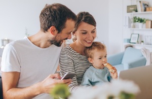 A busy family enjoying breakfast together