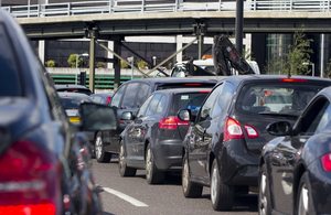 Cars queuing on a road