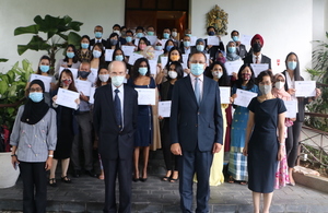 Group pic of High Commissioner, Chevening partners and scholars