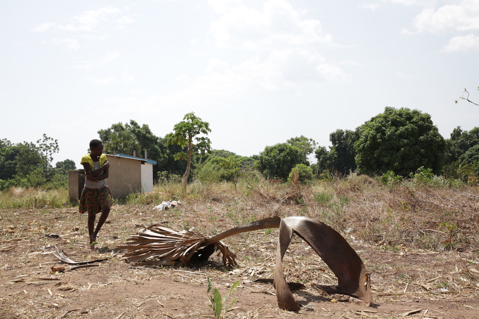 A young girl walks on the grounds around the church in Yei, South Sudan. (UN Photo)