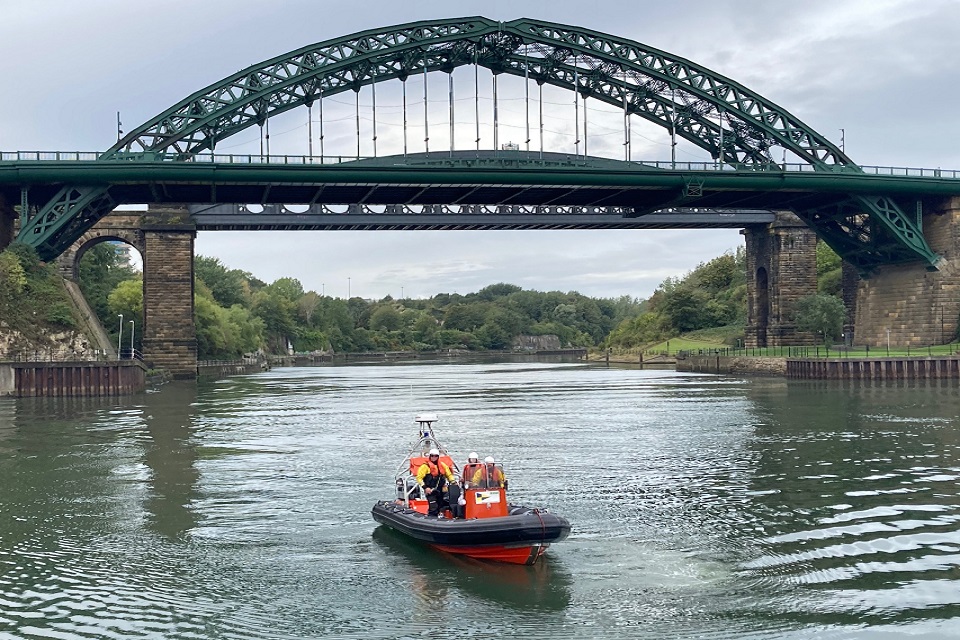 The images shows the EA and police on boat patrols underneath the Wear Bridge.