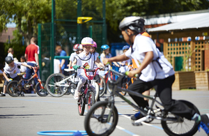 Children learning to cycle.