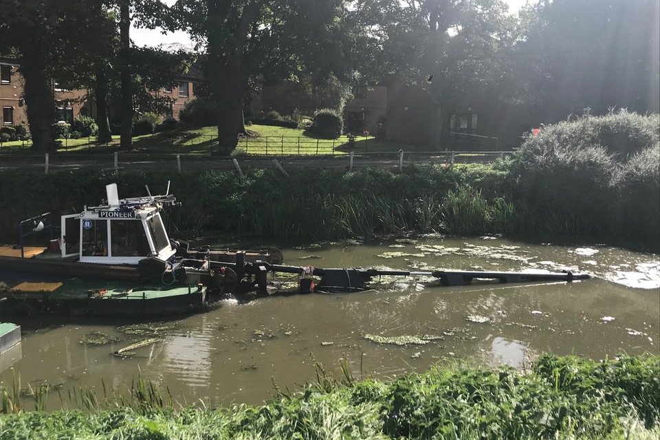 Dredging underway on Steeping River, Lincolnshire