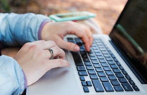 Hands typing on keyboard