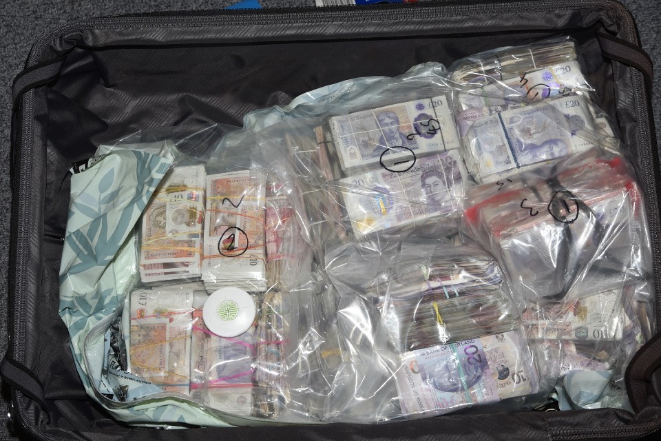 Woman charged over Heathrow Airport cash seizure