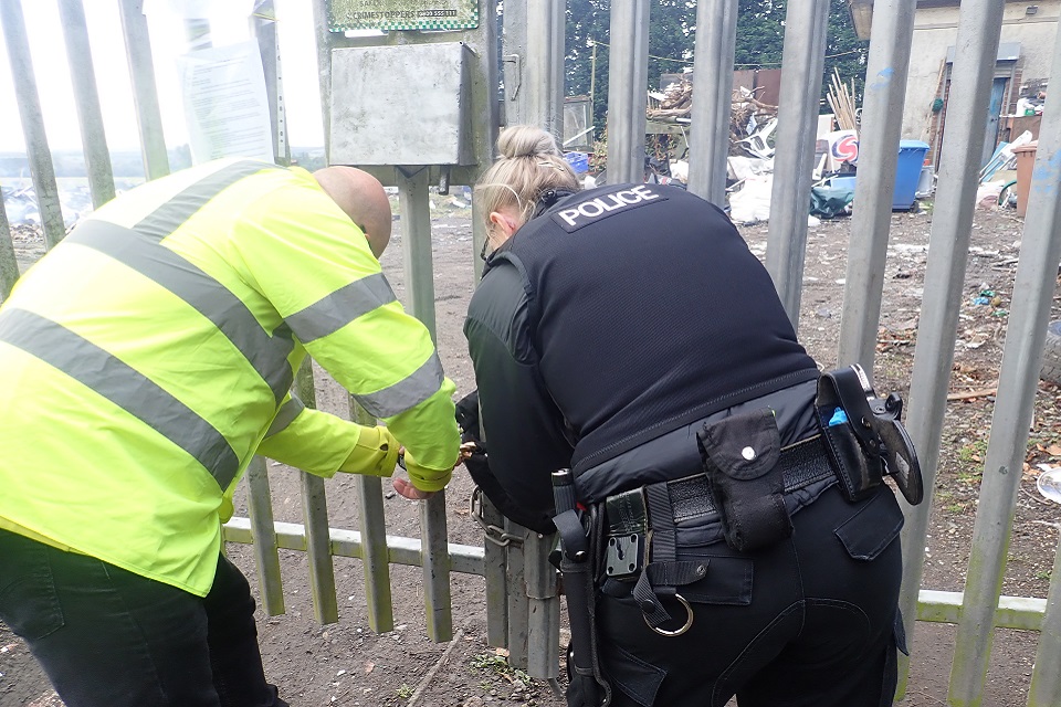 Image shows the Environment Agency and Northumbria Police locking the site gates