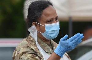 A reservist from the Royal Auxiliary Air Force in support of COVID-19, wearing a mask to show commitment to keeping safe.