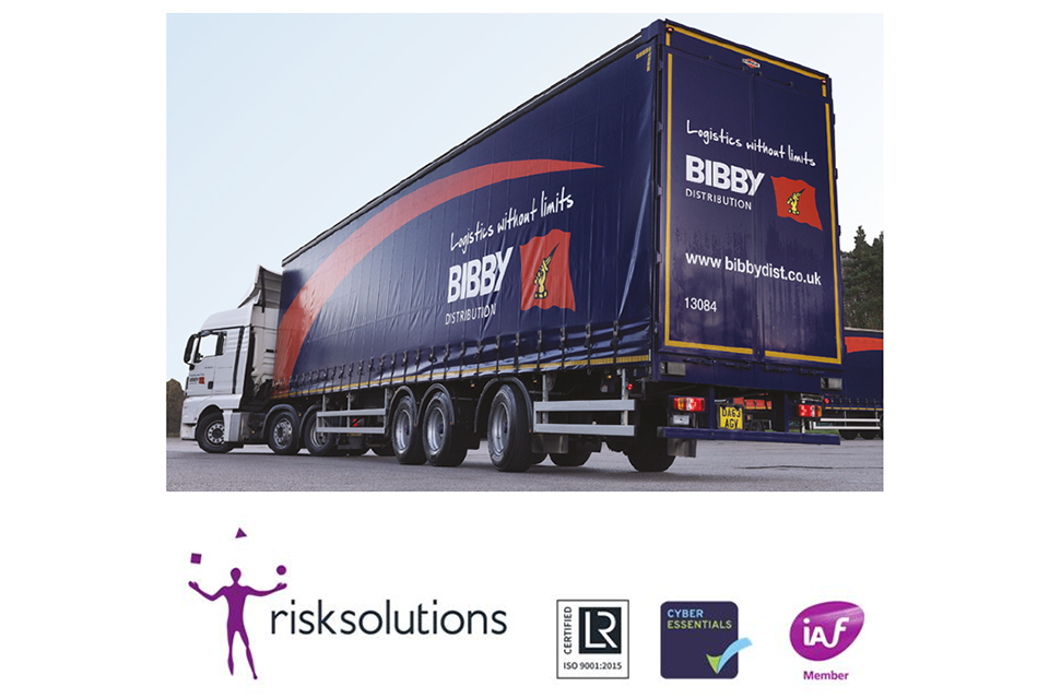 Tractor unit with longer semi-trailer in Bibby haulage livery, plus Risk Solutions logo and accreditations