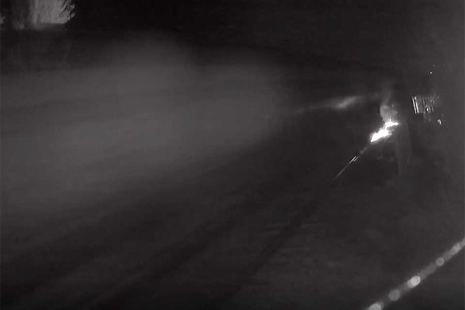 CCTV image showing the third wagon passing Pen-y-Bedd level crossing