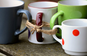 Cups tied together with string