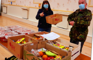 Egremont volunteers arranging the Christmas food parcels