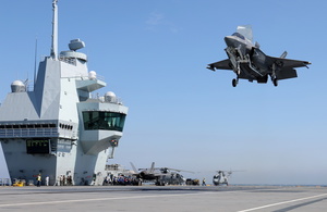 An RAF F-35B fighter jet lands on board HMS Queen Elizabeth