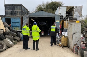 Image shows an Environment Agency officer with two British Transport Police officers all wearing