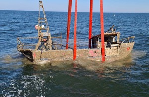 Wreck of fishing vessel Nicola Faith being raised out of the water