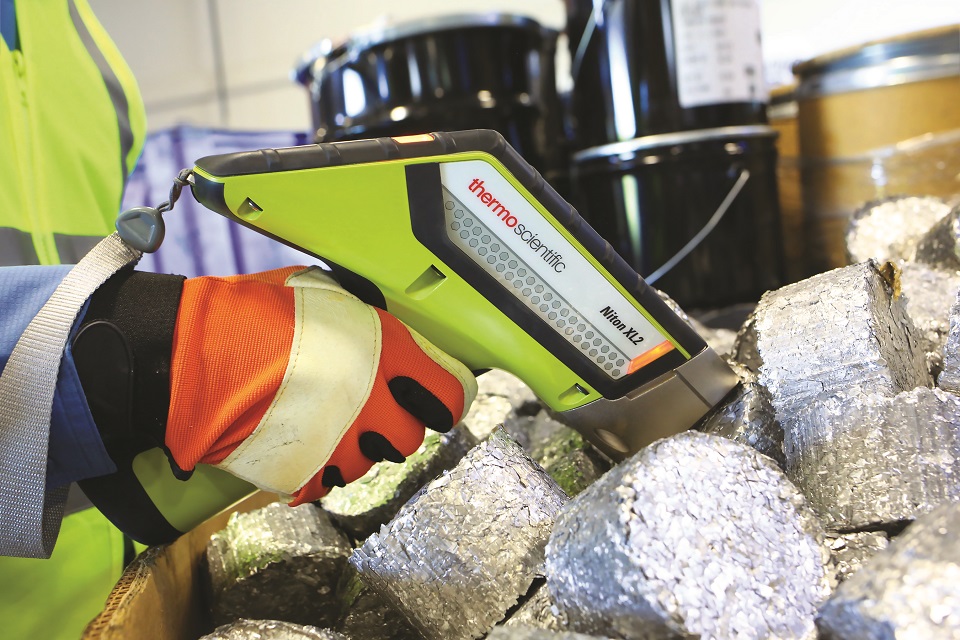 Portable XRF analyser on metal billets (Courtesy of Niton UK)