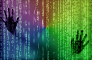 Image showing hands trapped behind digital coding