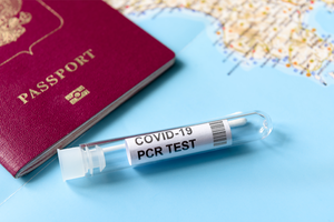 Image showing a passport, map and COVID-19 PCR test tube