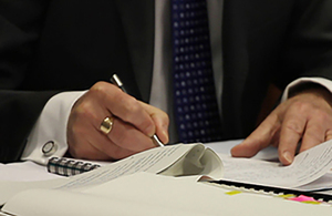 A man writing down information