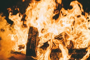 Close-up of pieces of wood on fire in a bonfire