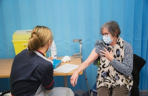 Older woman getting vaccinated