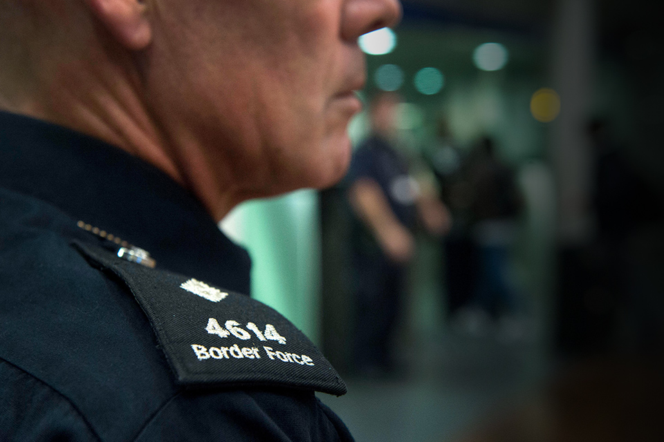 Close up of person in Border Force uniform