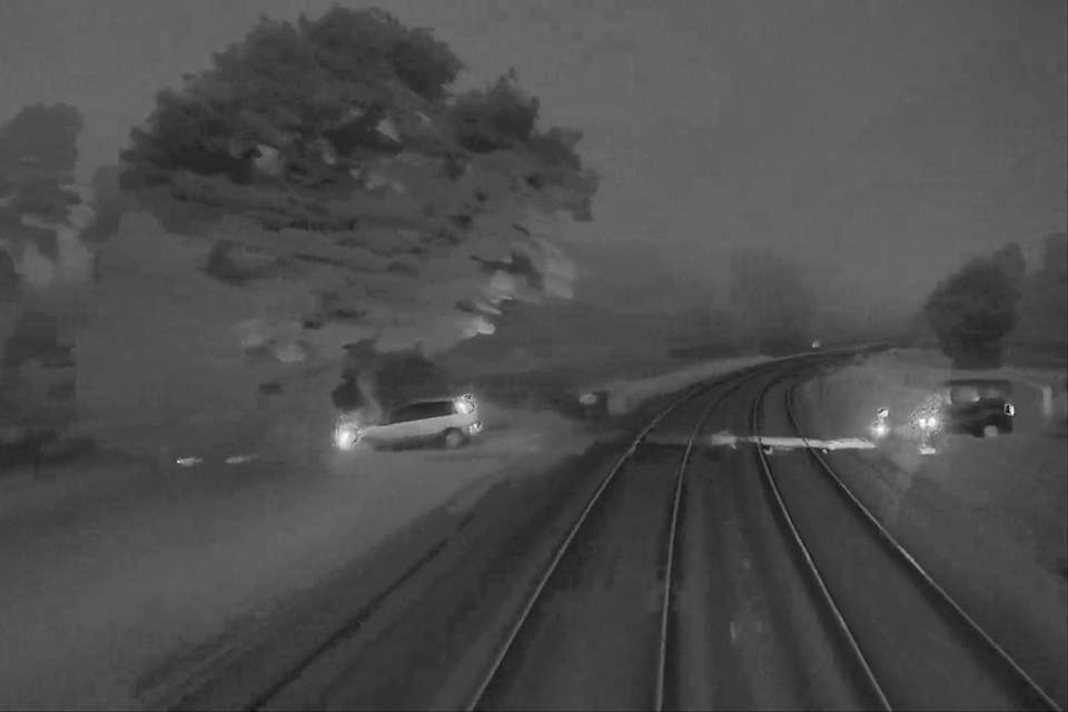 forward-facing CCTV, showing the location of the cars (crossing from right to left) 