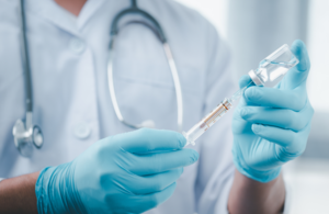 nurse with vaccine