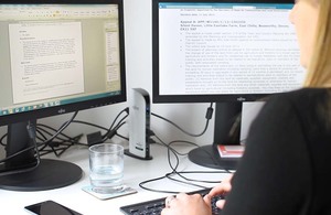 Female inspector writing a decision