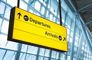 Airport arrivals and departures sign.