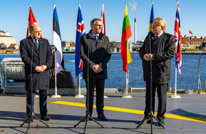 Ben Wallace with his counterparts on board the Danish frigate